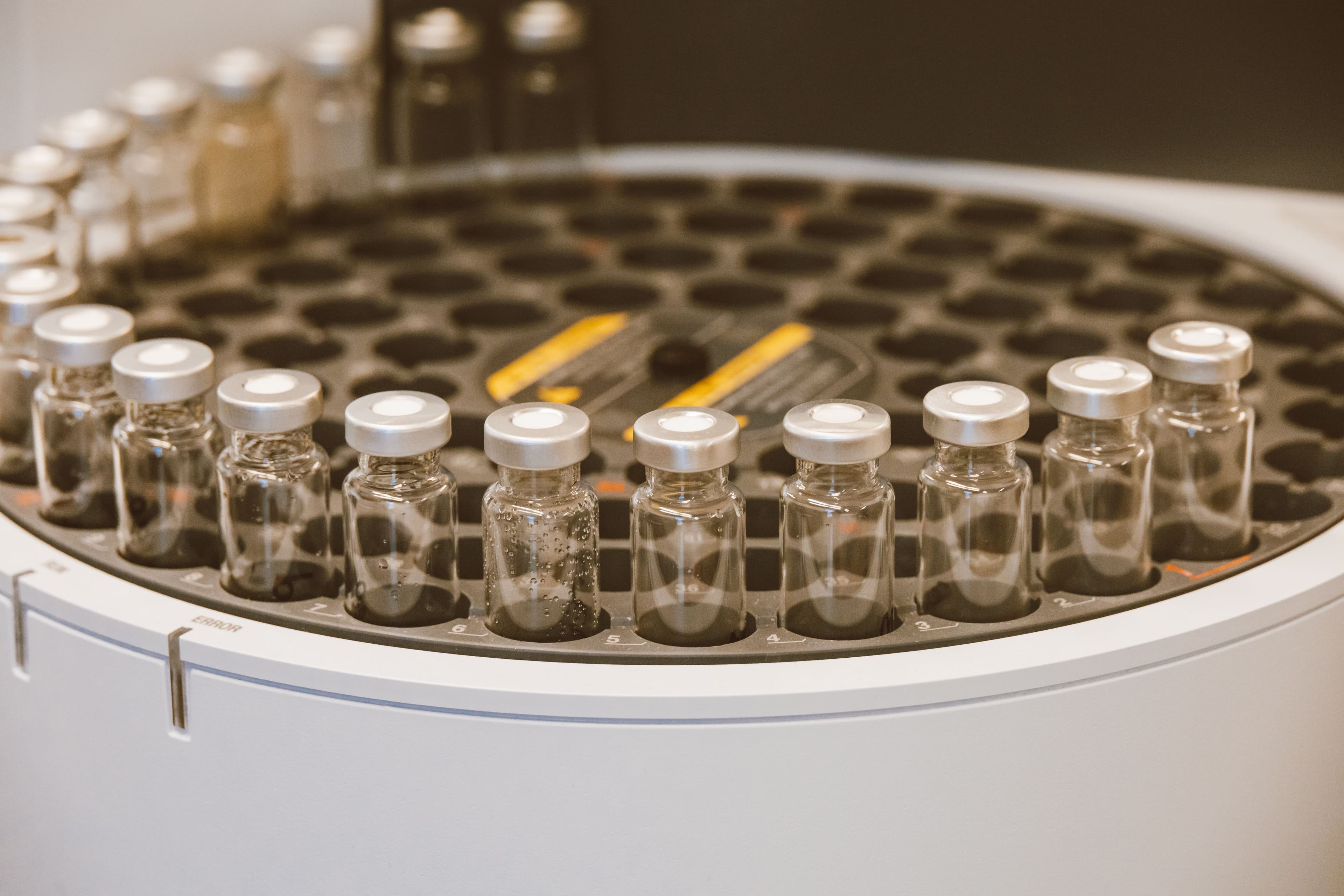Lab vials in a research setting